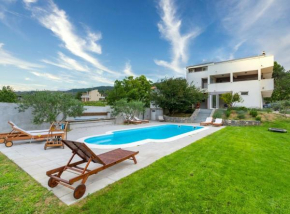 Serene Rural Villa with Pool, Sun Deck, and Children's Play Area